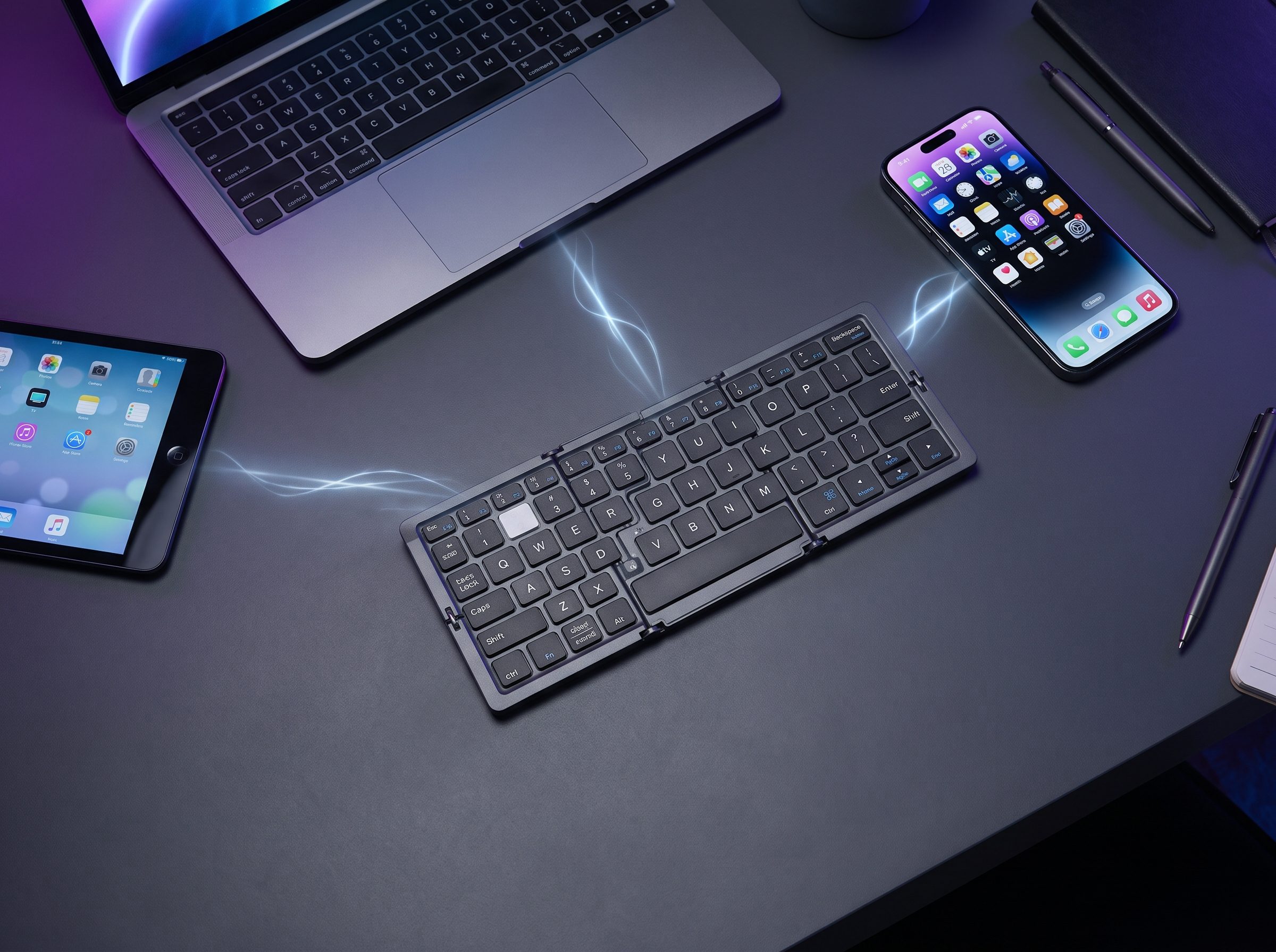 Keyboard paired with a phone, tablet and laptop
